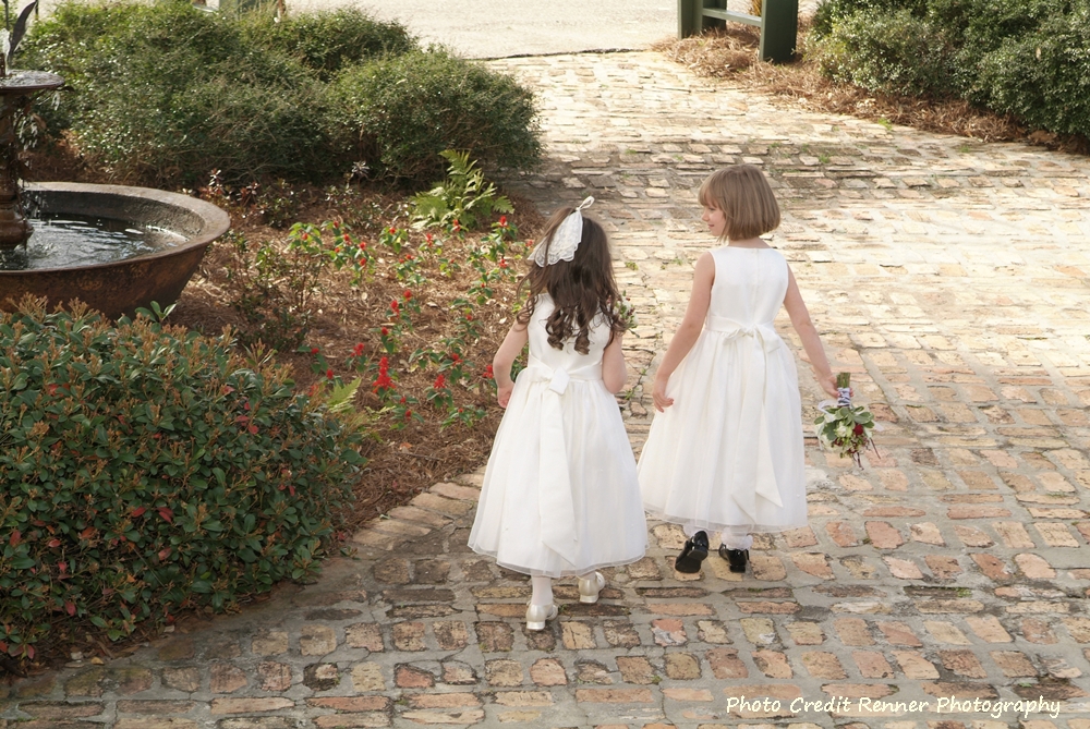 Two little girls on brick path dressed in Sunday best Old Southern Rice Dressing www.diningwithmimi.com