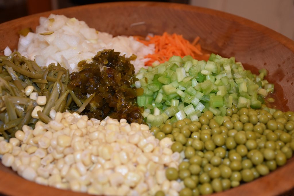 Corn, Sweet Peas, Green Beans, Onion, Celery, candied jalapenos and more for Companys Coming Premade Steeped Side Salad
